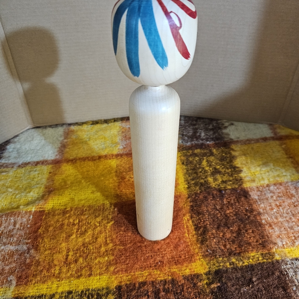Handcrafted Signed Kokeshi Doll with Red Floral Design - Picture 3 of 5